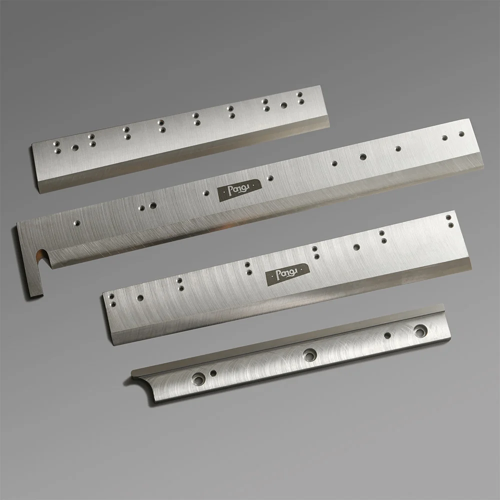 Saddle stitch trimmer knife in various shape, made of polished steel with mounting hole for installation.