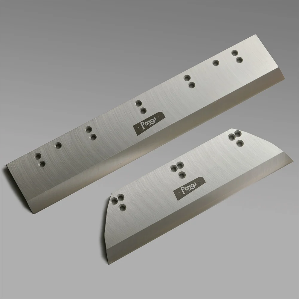 Three knife trimmer blade made of polished steel, featuring mounting hole for secure installation.